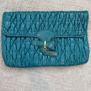 Sisley Crystal Matelassé nappa leather clutch bag in a teal or blue color